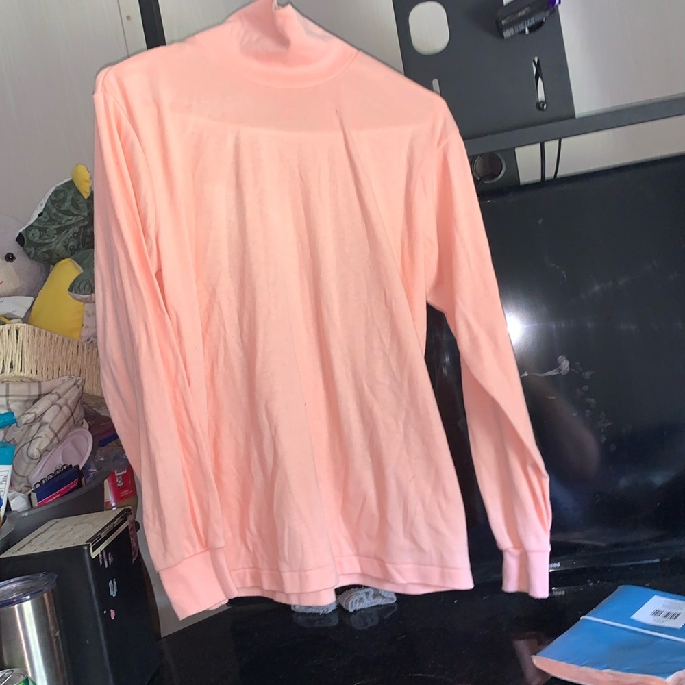 Bobbie brooks turtle neck long sleeve t-shirt. Pink in color.